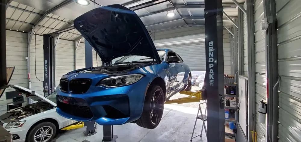 Mechanical work on a vehicle raised in our service bay