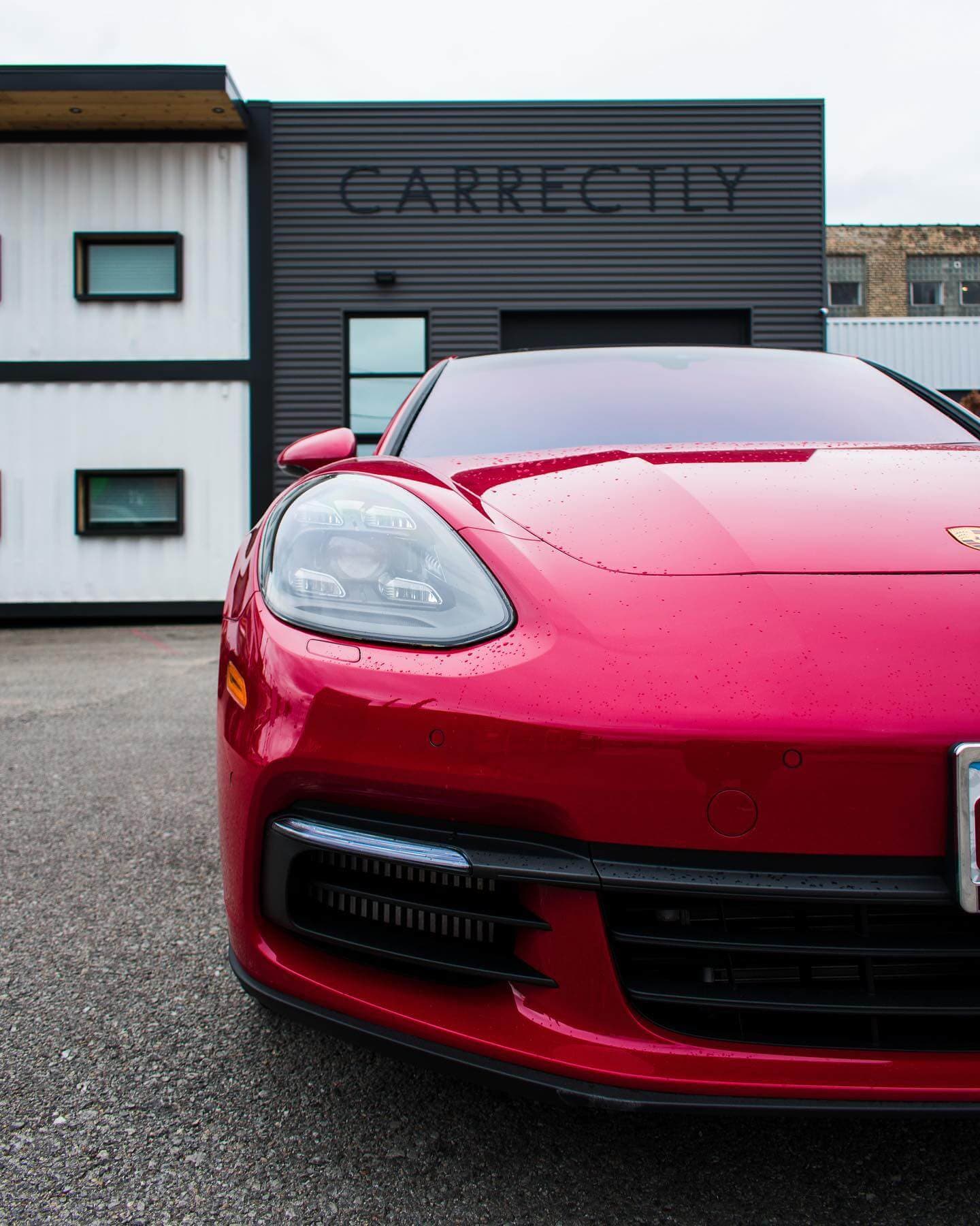 Red sports car with a glossy finish, treated with exterior detail
