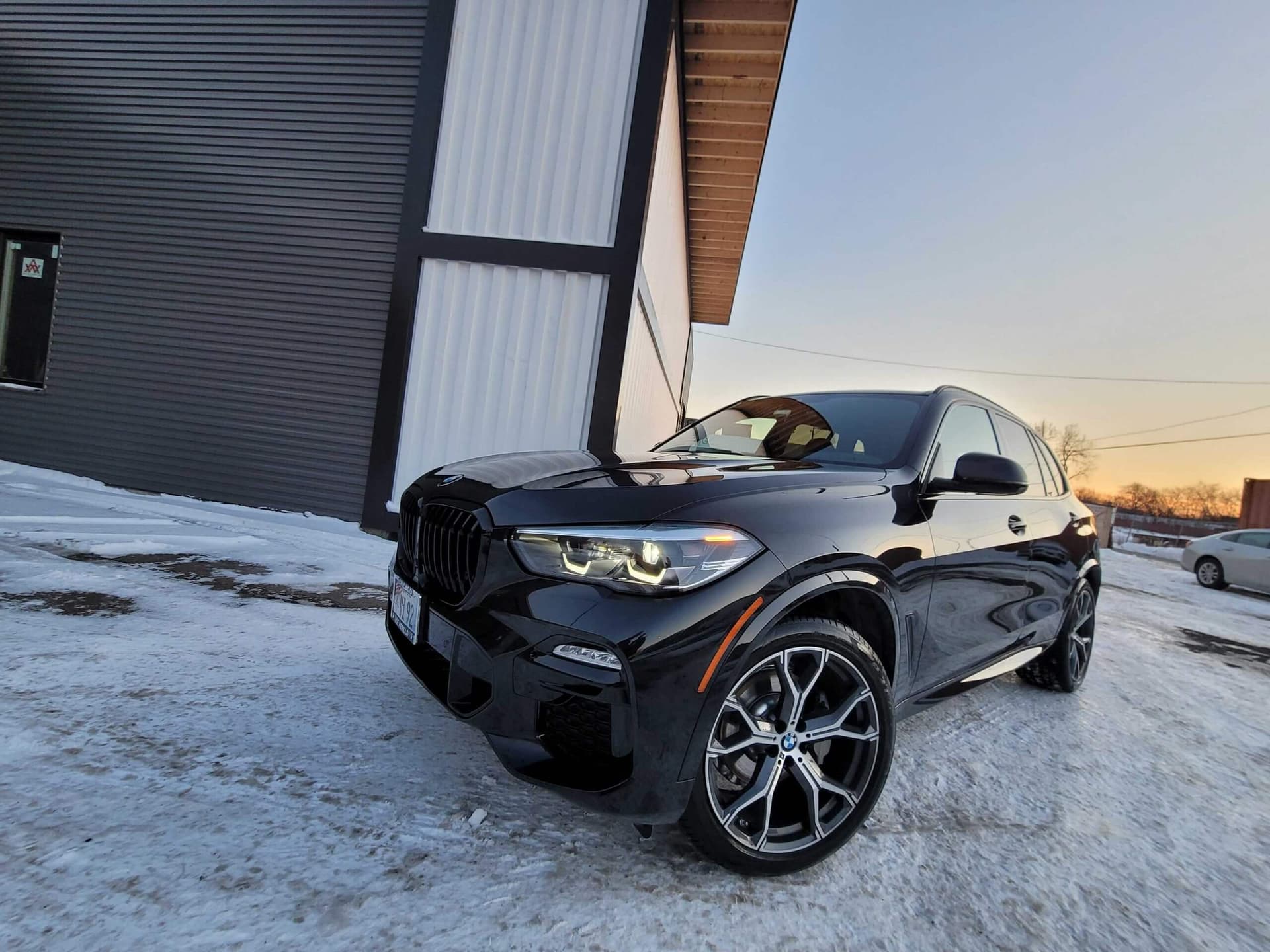 Black SUV parked outside, showcasing an exterior detail shine